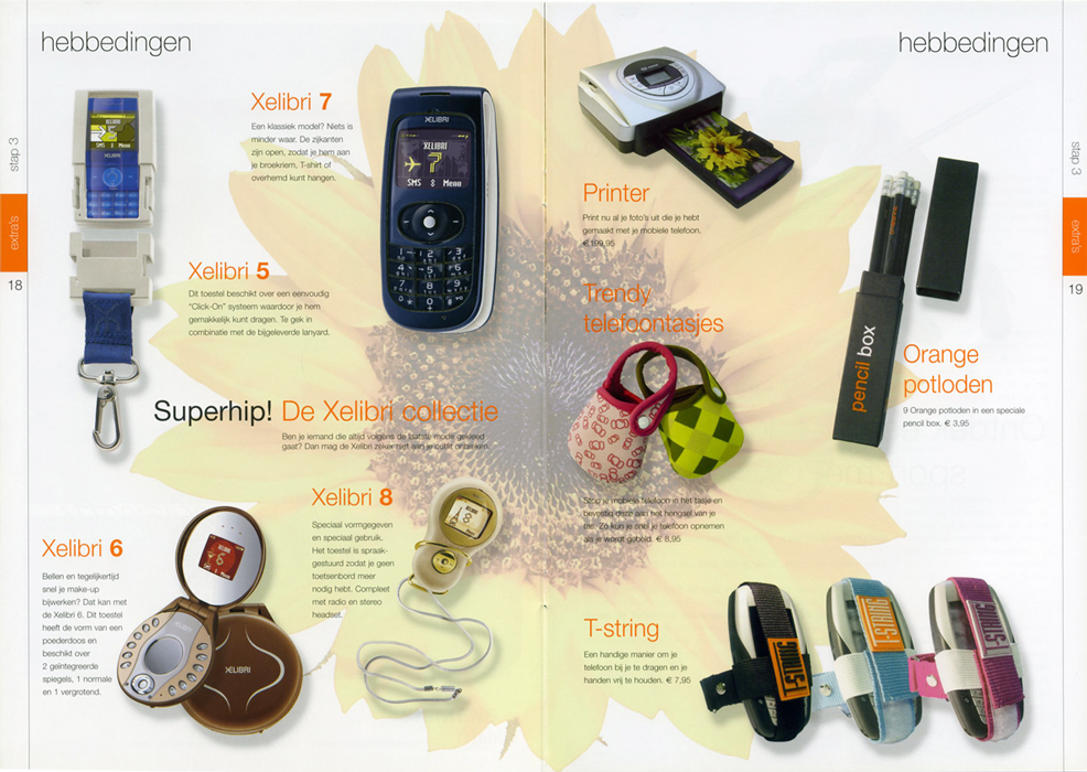 Zonnige spread "hebbedingen" van Orange magazine waar een printer, Xelibri telefoons, tasjes, potloden en T-strings worden aangeboden.